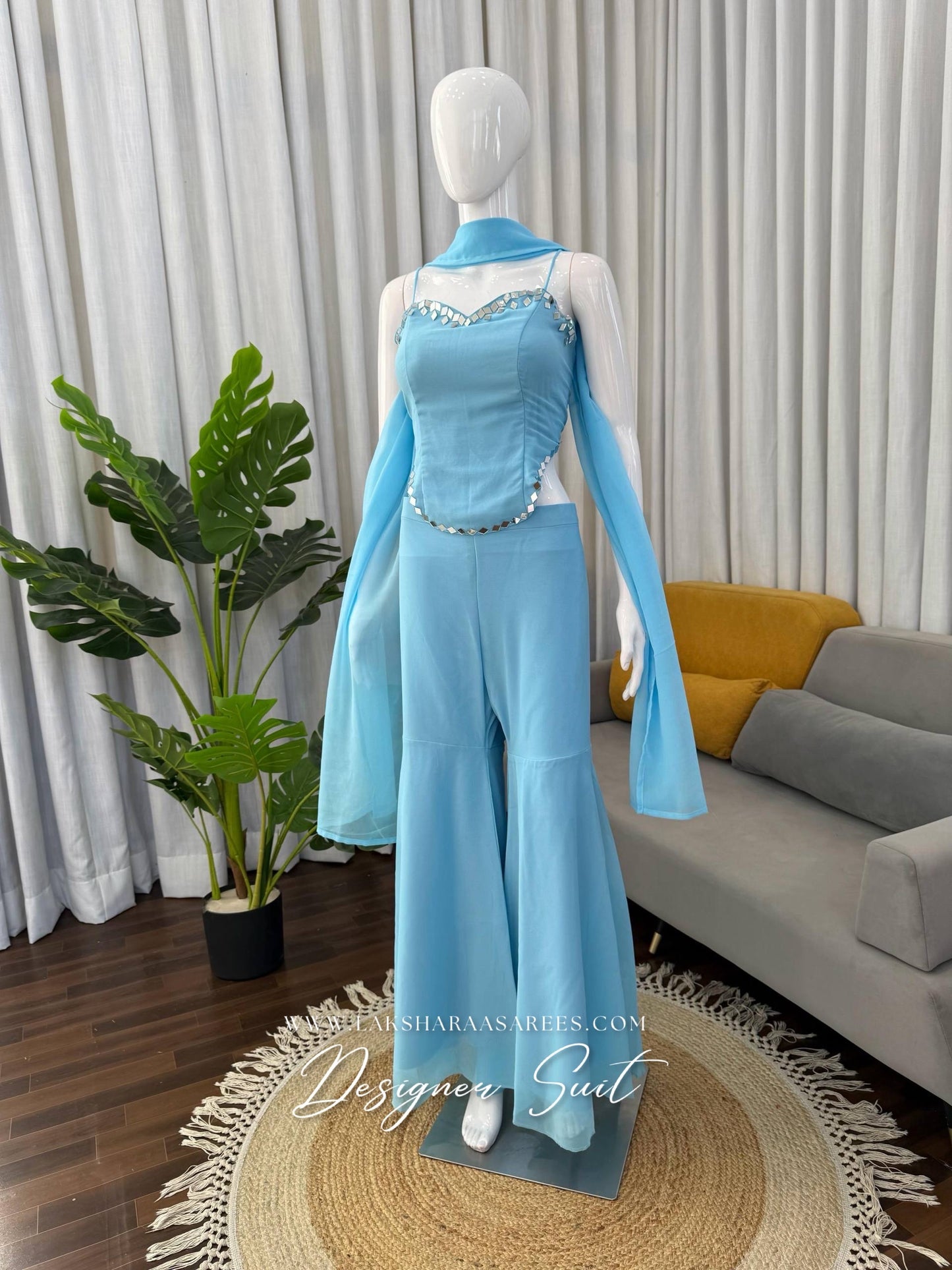 Elegant ISHITA 90s Special Georgette Corset Suit by Laksharaa Sarees featuring a stylish corset top and matching traditional pants.