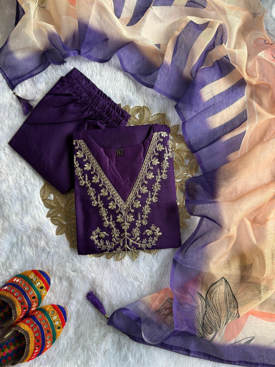 Dark purple comfy kurti set with intricate embroidery, paired with matching leggings, designed by Laksharaa Sarees.