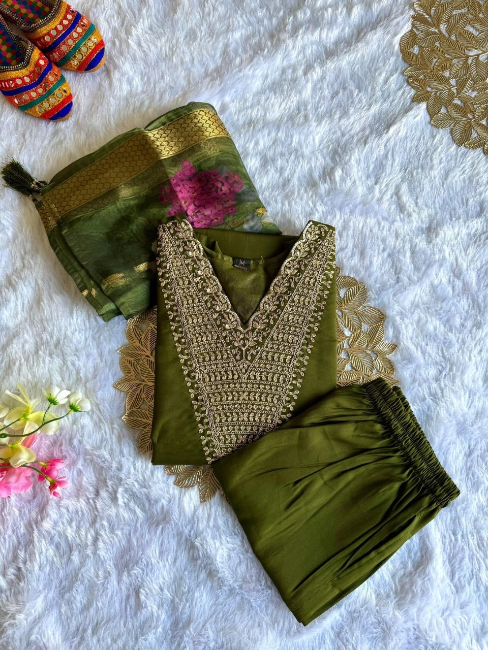 Dark green comfy kurti set with intricate embroidery, paired with matching leggings, designed by Laksharaa Sarees.
