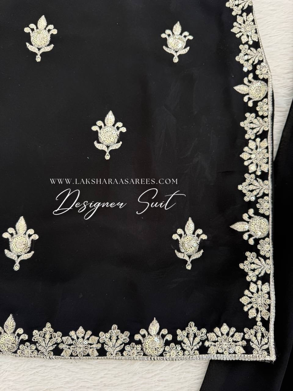 Black Georgette Pallazo Suit by Laksharaa Sarees, featuring a stylish kurta with matching pallazo pants and intricate embroidery.