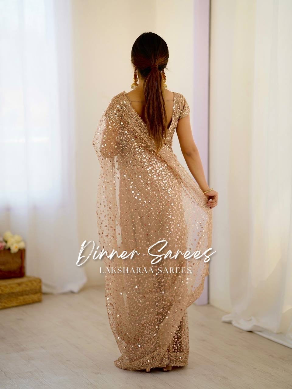 NIKITA — Shimmery Net Georgette Saree