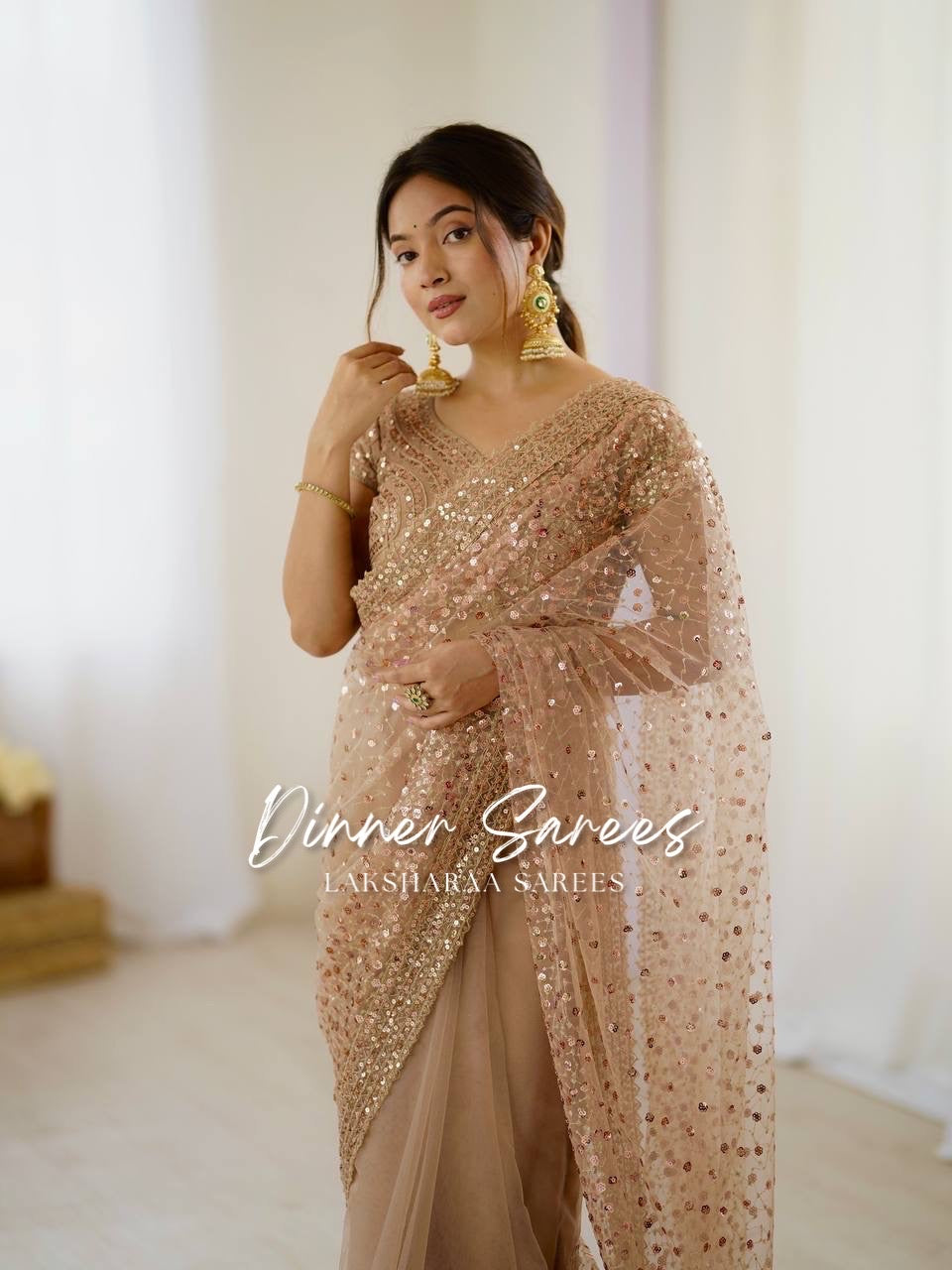 NIKITA — Shimmery Net Georgette Saree