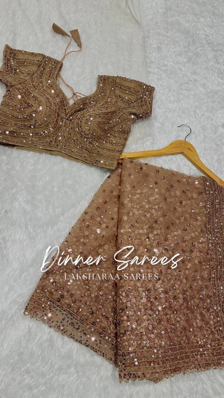 NIKITA — Shimmery Net Georgette Saree