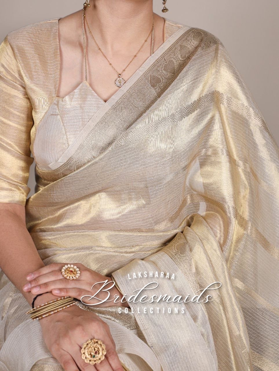 SHRUTI- Gold Tissue Saree