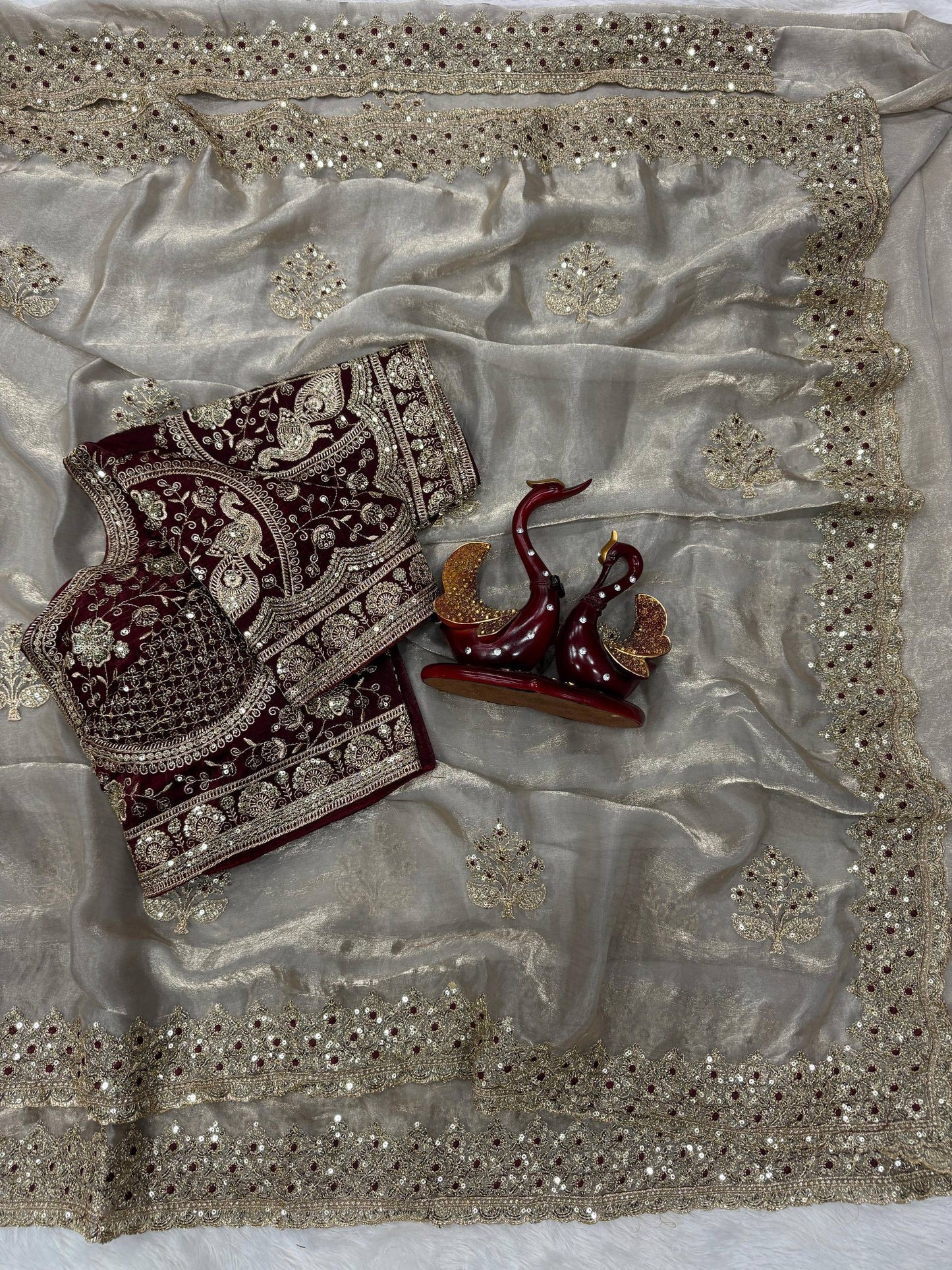 Laksharaa Sarees JESSIA premium shimmer saree with matching readymade blouse, featuring elegant fabric and intricate design.