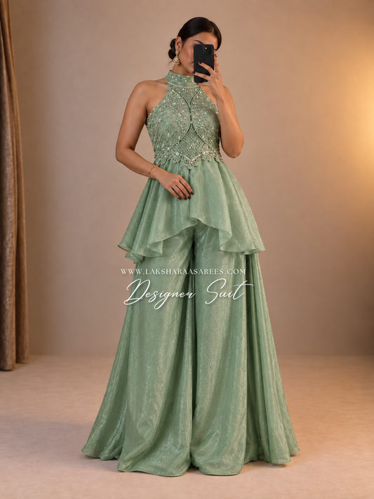Shimmer silk halter top designer suit with matching palazzo pants by Laksharaa Sarees, featuring elegant draping and intricate details.