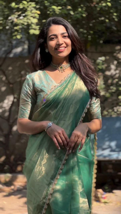 DOLLA - Green Shimmer Silk Saree x Gold Border