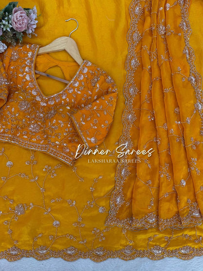 Laksharaa Sarees MEENA Designer Saree Mustard Yellow laid out with embroidered blouse and border