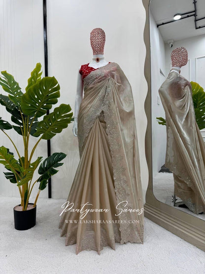 REHA — Luxury Shimmer Silk Saree in champagne shade with contrast red blouse