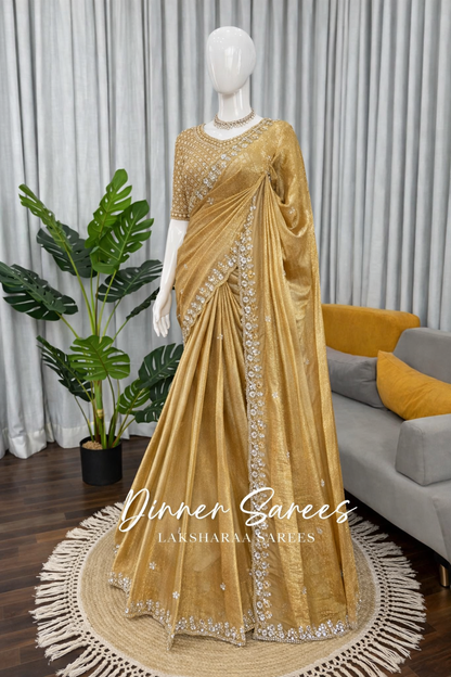 Elegant Laksharaa Sarees ALISA georgette dinner saree with embroidered border, showcasing intricate craftsmanship and flowing fabric.