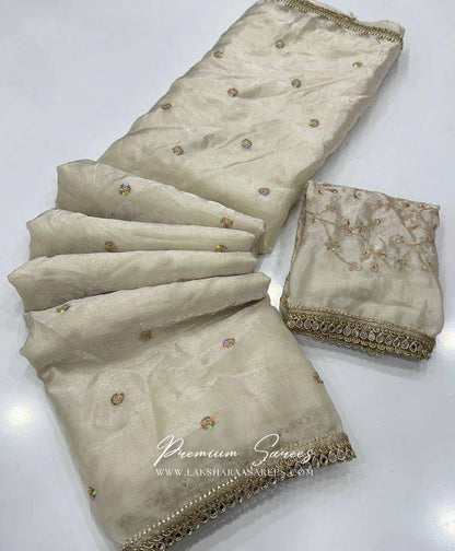 Shimmer satin saree with embroidered blouse from Laksharaa Sarees, featuring elegant fabric and detailed embroidery for special occasions.
