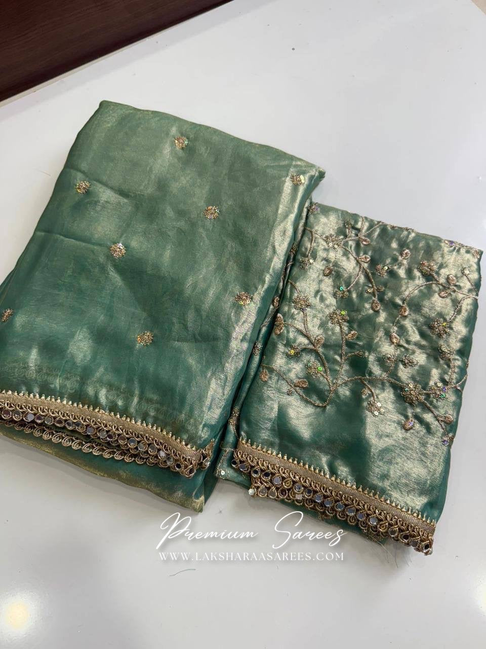 Elegant Swarni shimmer satin saree with embroidered blouse by Laksharaa Sarees, displayed in a detailed product image.