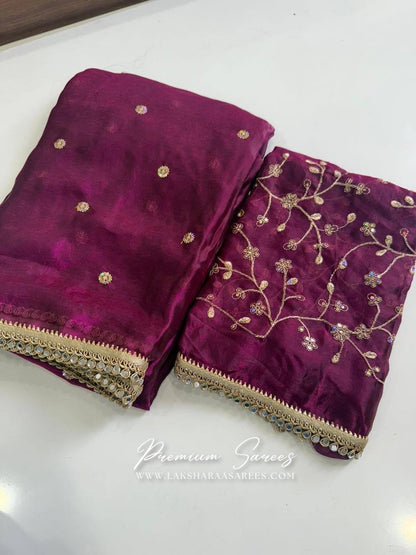 Shimmer satin saree with intricate embroidery from Laksharaa Sarees, paired with a matching embroidered blouse.