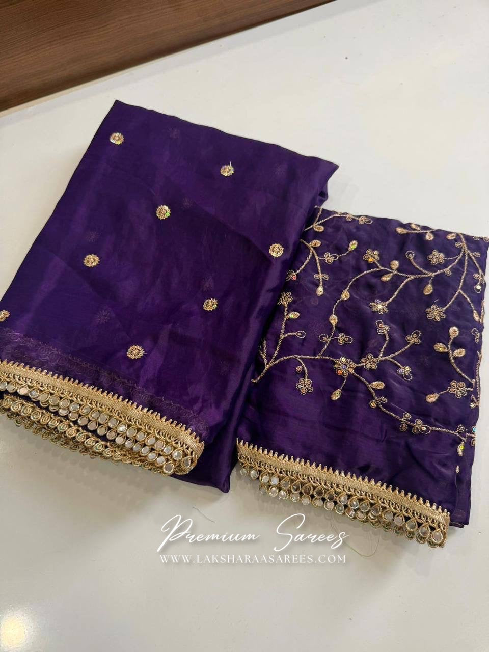 Shimmer satin saree with embroidered blouse from Laksharaa Sarees, showcasing intricate embroidery and elegant fabric.