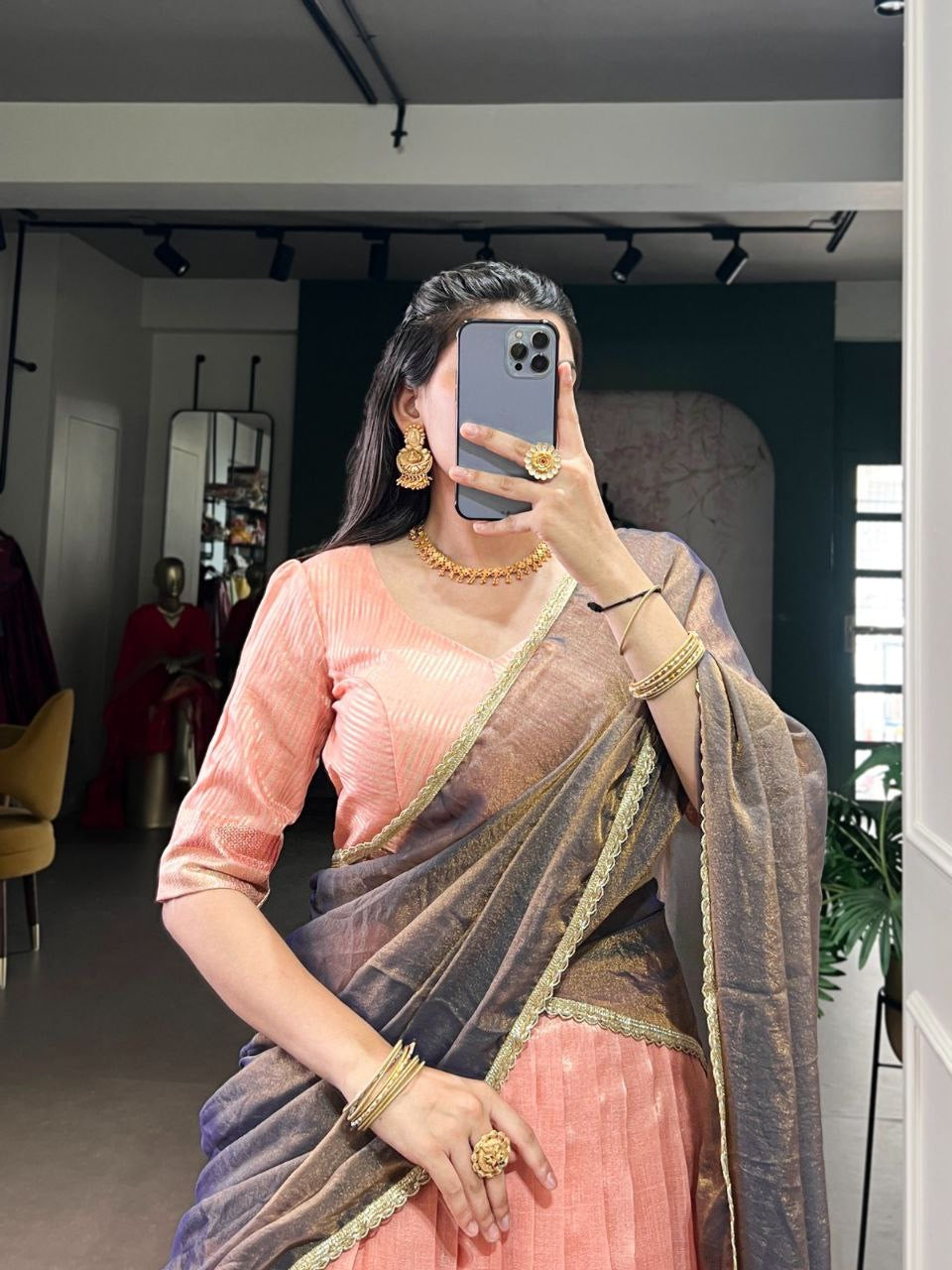 Pink pastel crush silk half saree lehenga with intricate embroidery and a matching blouse, fully stitched by Laksharaa Sarees.