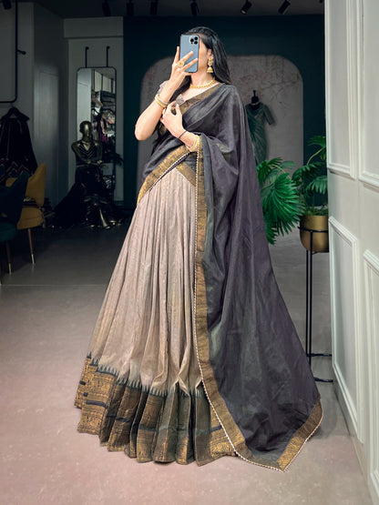 South Special Half Saree Lehenga by Laksharaa Sarees featuring traditional embroidery and vibrant fabric, displayed on a hanger.