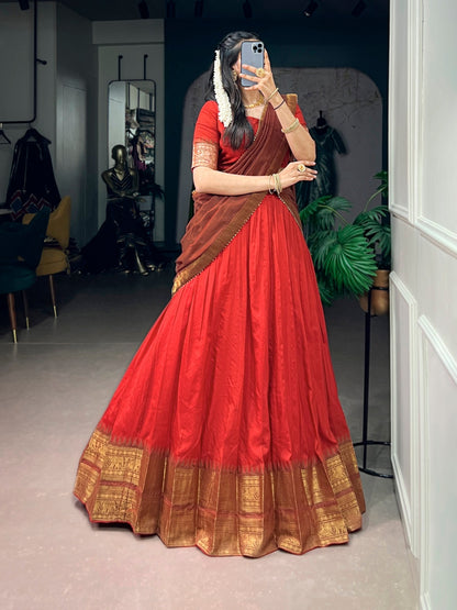 South Indian half saree lehenga by Laksharaa Sarees featuring intricate embroidery and vibrant colors.
