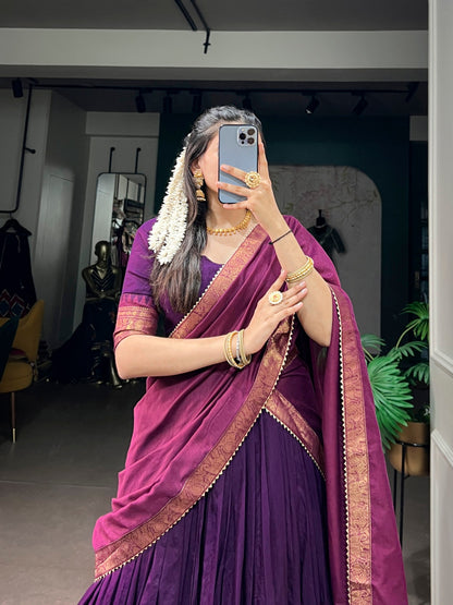 South Indian half saree lehenga by Laksharaa Sarees, featuring intricate embroidery and vibrant traditional design.