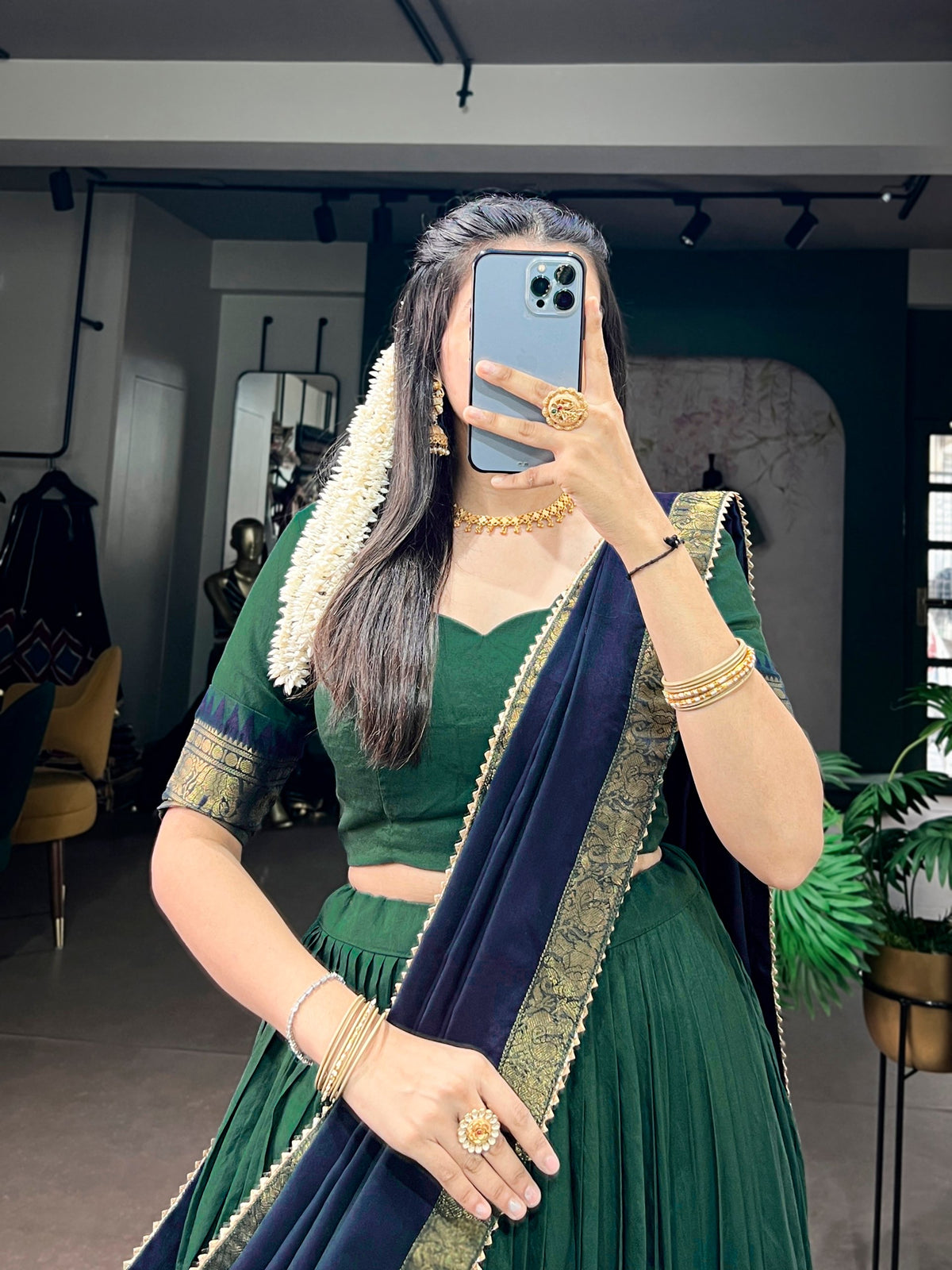 South special half saree lehenga from Laksharaa Sarees featuring intricate embroidery and vibrant fabric in a traditional style.