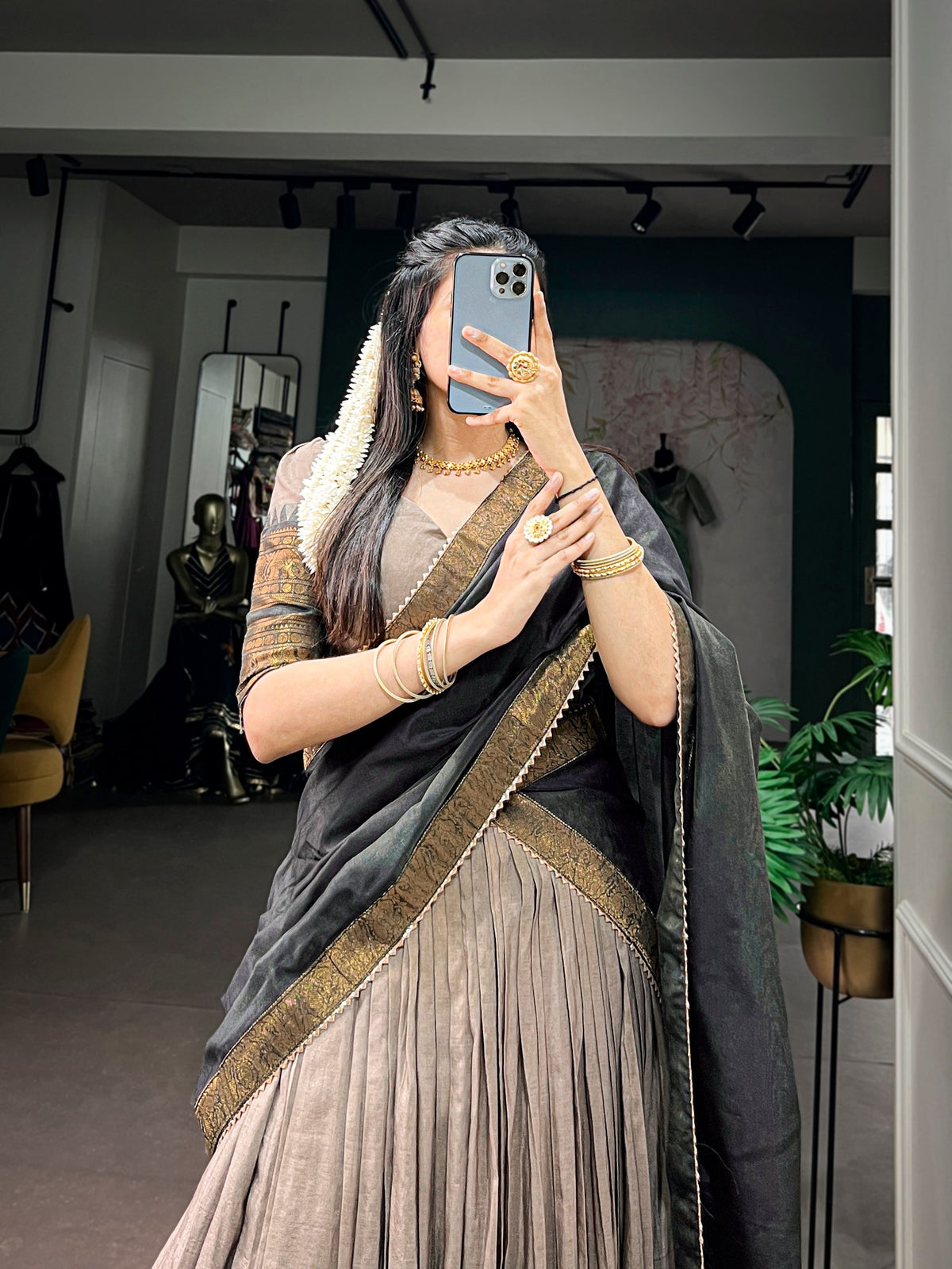 South Indian half saree lehenga by Laksharaa Sarees featuring intricate embroidery and vibrant colors.