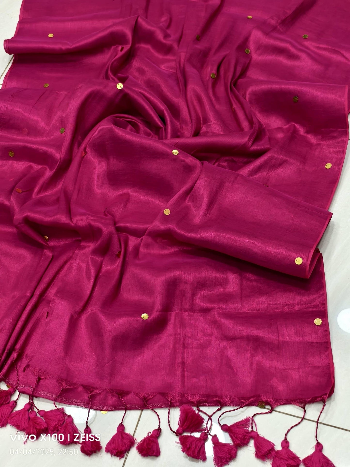 Laksharaa Sarees Tissue Raaga Saree with Pretty Tassels, featuring intricate fabric and elegant tassel details in soft hues.