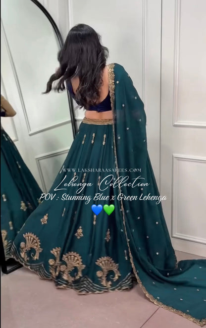 Green and blue Rangoli silk Lehenga by Laksharaa Sarees, featuring intricate embroidery and traditional design.