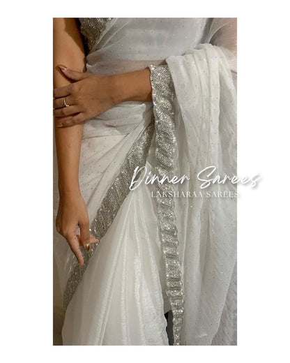 Laksharaa Sarees DREAMI Luxe Shimmer Silk Saree with silver Jarkan border, showcasing elegant fabric and intricate border details.