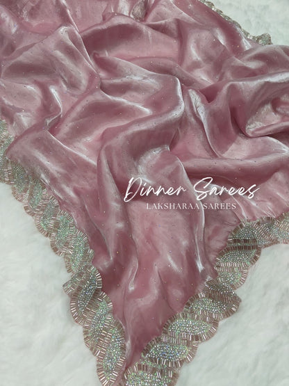 Luxe shimmer silk saree with silver jarkan border from Laksharaa Sarees, showcasing elegant drape and intricate silver embroidery.