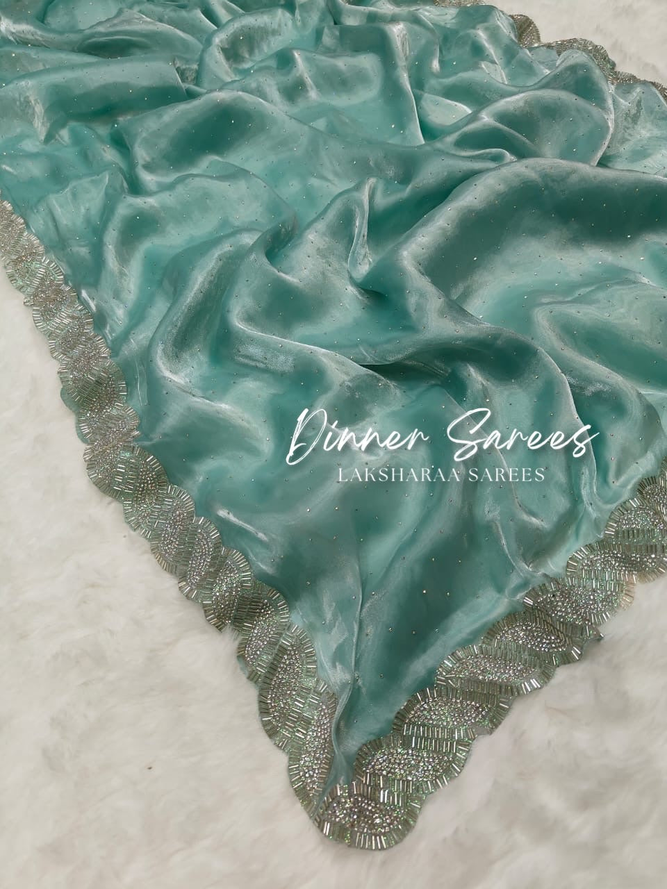 Elegant Luxe Shimmer Silk Saree by Laksharaa Sarees featuring a silver Jarkan border and intricate detailing.