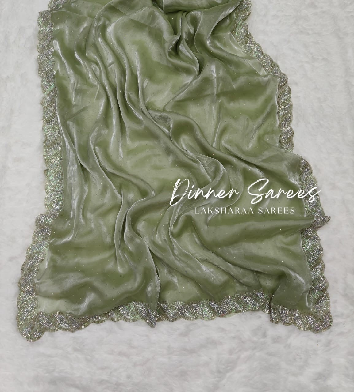 Laksharaa Sarees DREAMI Luxe Shimmer Silk Saree with silver Jarkan border and intricate embroidery on elegant fabric.