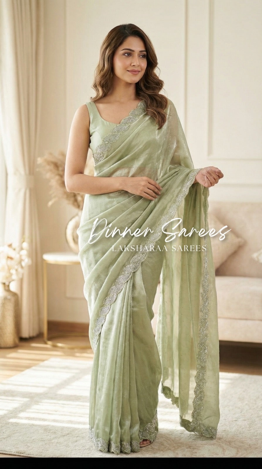 Laksharaa Sarees Luxe Shimmer Silk Saree with silver Jarkan border, featuring elegant silver embroidery and rich silk fabric.