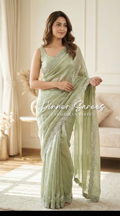 Laksharaa Sarees Luxe Shimmer Silk Saree with silver Jarkan border, featuring elegant silver embroidery and rich silk fabric.