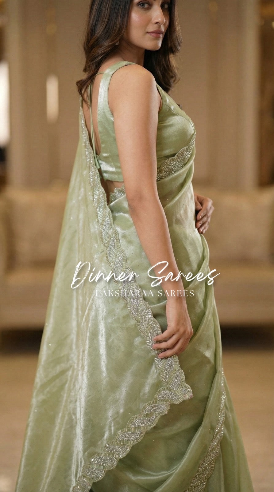 Luxe shimmer silk saree by Laksharaa Sarees featuring a silver Jarkan border and elegant draping.