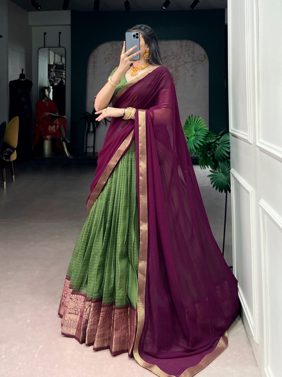 Luxurious Dola Chex half saree lehenga by Laksharaa Sarees, featuring intricate embroidery and vibrant colors.