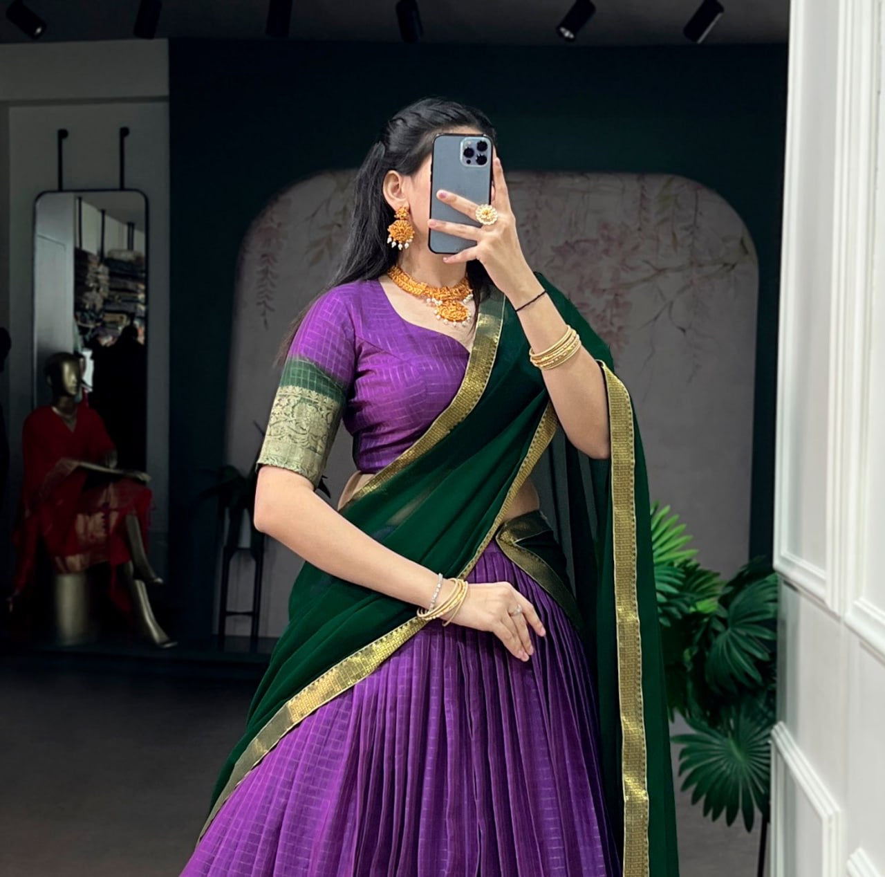 Pink and gold Dola Chex half saree lehenga with intricate embroidery, showcased by Laksharaa Sarees in a detailed close-up image.