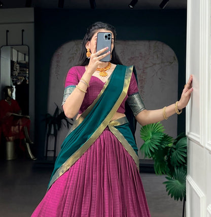 Pink and gold Dola Chex half saree lehenga from Laksharaa Sarees featuring intricate embroidery and traditional design.