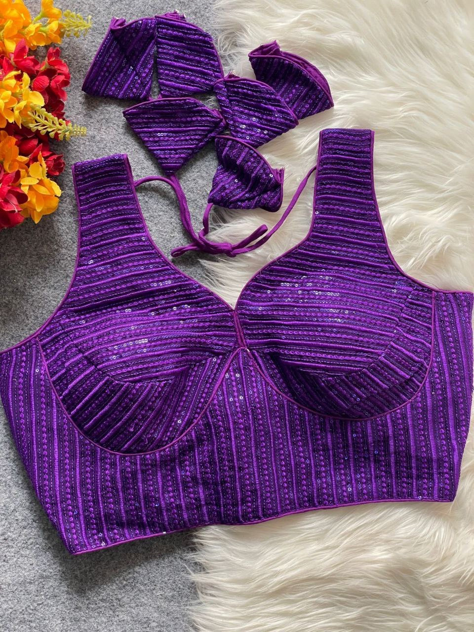 Bright red partywear readymade blouse by Laksharaa Sarees, featuring intricate embroidery and stylish design.