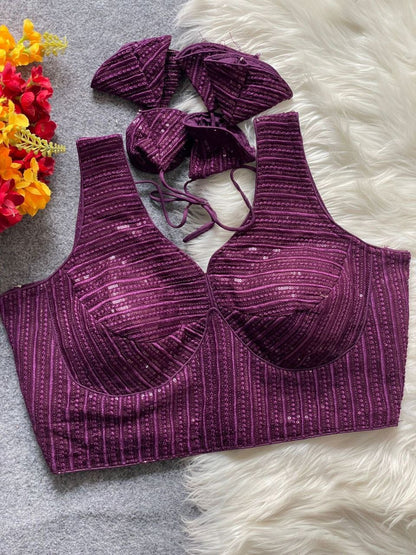 Ruby partywear readymade blouse by Laksharaa Sarees, featuring intricate embroidery and stylish design for festive occasions.