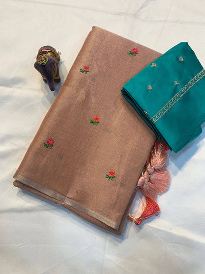 Soft simmer tissue linen saree by Laksharaa Sarees featuring elegant, lightweight fabric with intricate woven patterns.