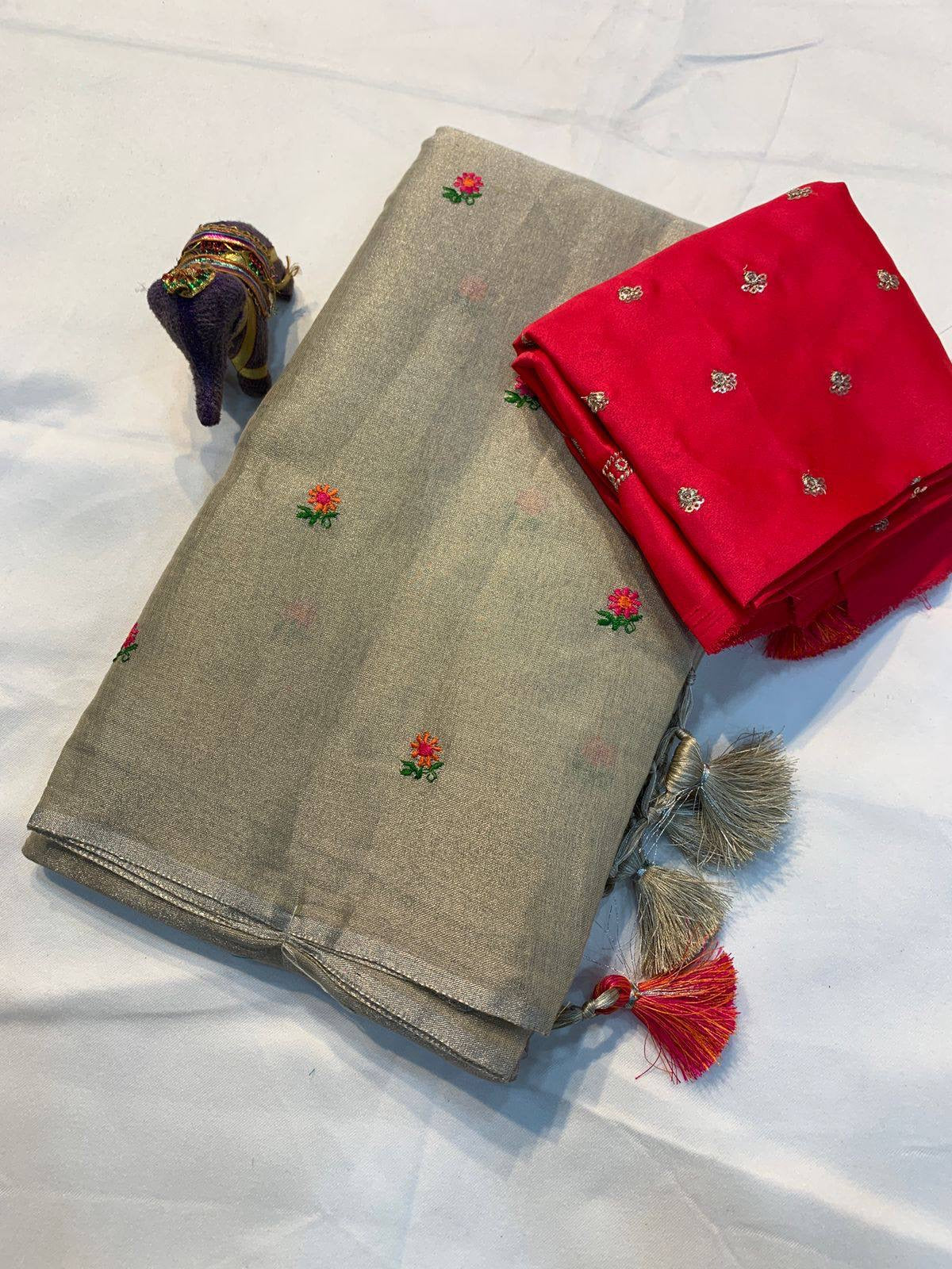 Soft simmer tissue linen saree in light tones, featuring delicate fabric and traditional design from Laksharaa Sarees.