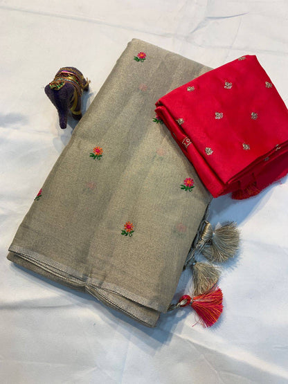 Soft simmer tissue linen saree in light tones, featuring delicate fabric and traditional design from Laksharaa Sarees.