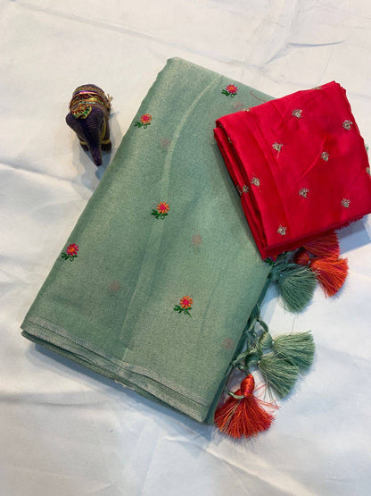 Soft simmer tissue linen saree by Laksharaa Sarees featuring elegant, lightweight fabric with intricate detailing and subtle sheen.