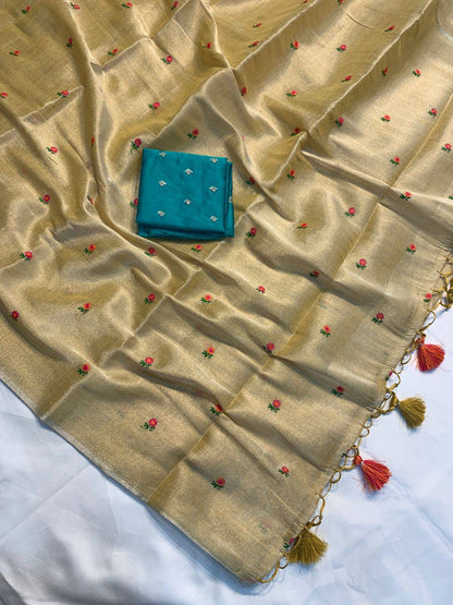 Soft simmer tissue linen saree by Laksharaa Sarees, featuring elegant, lightweight fabric with intricate detailing in a graceful drape.