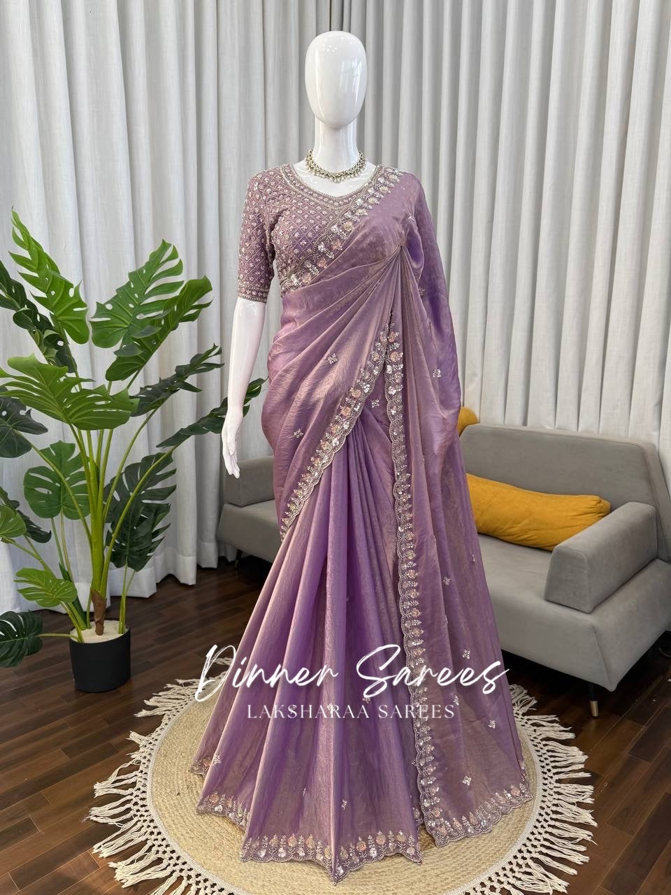 Alisa Georgette dinner saree by Laksharaa Sarees with embroidered border, showcasing elegant drape and intricate embroidery details.