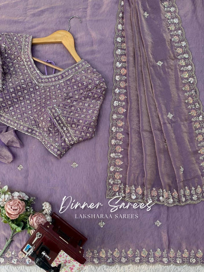Alisa Georgette Dinner Saree by Laksharaa Sarees featuring an embroidered border and elegant drape in soft fabric.