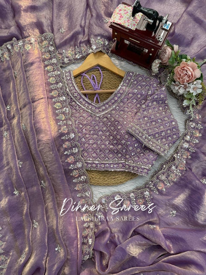 Elegant georgette dinner saree by Laksharaa Sarees with intricate embroidered border and flowing drape.