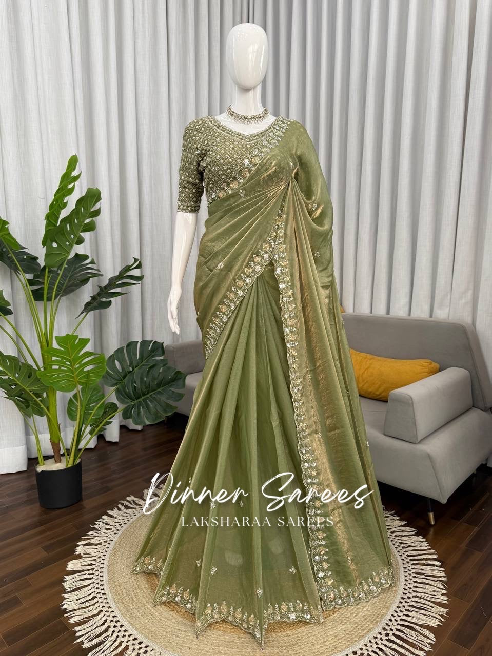 Alisa Georgette dinner saree by Laksharaa Sarees with embroidered border, shown draped with intricate detailing and elegant fabric.