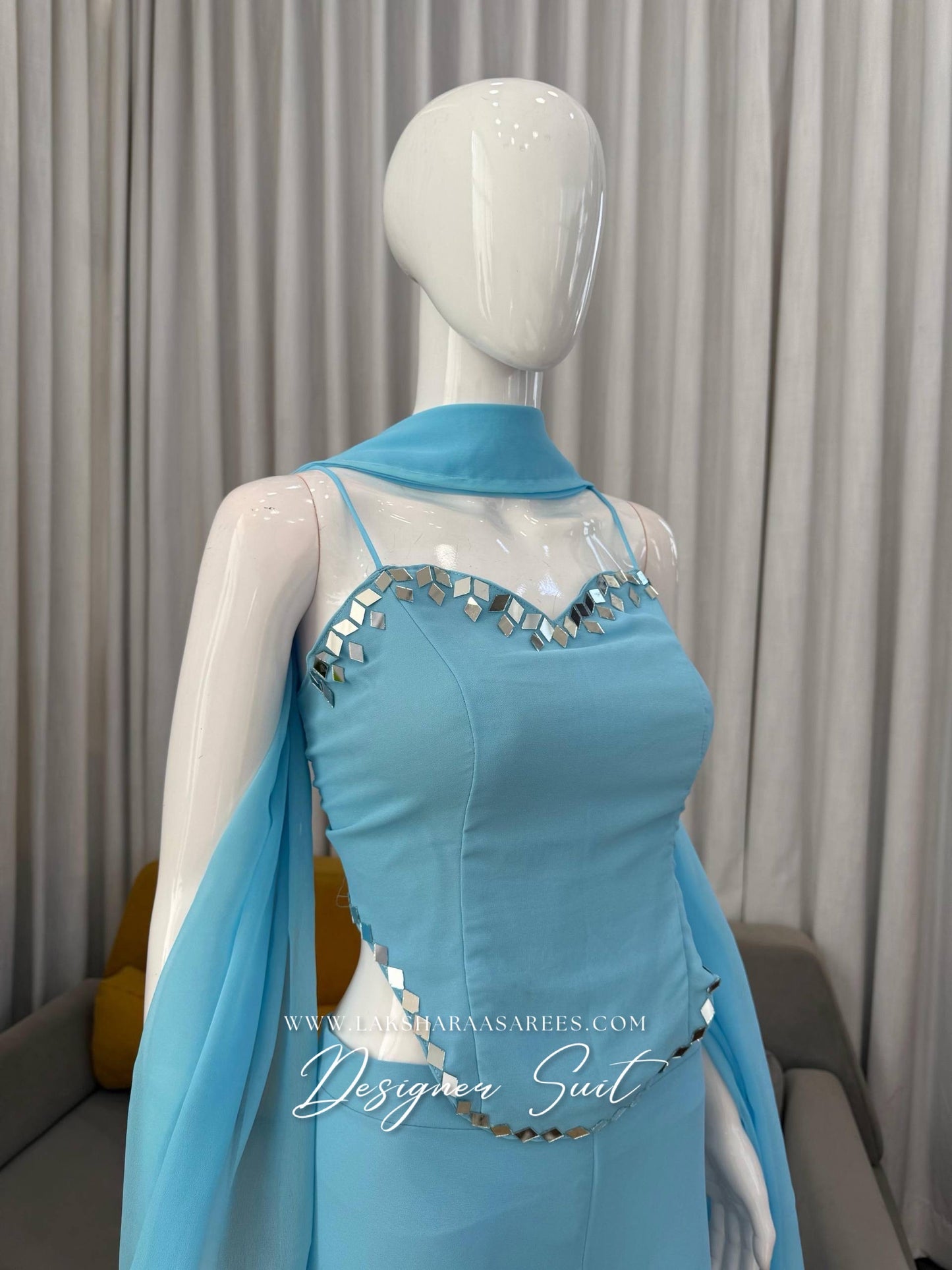 Elegant ISHITA 90s Special Georgette Corset Suit by Laksharaa Sarees, featuring intricate design and vibrant colors.