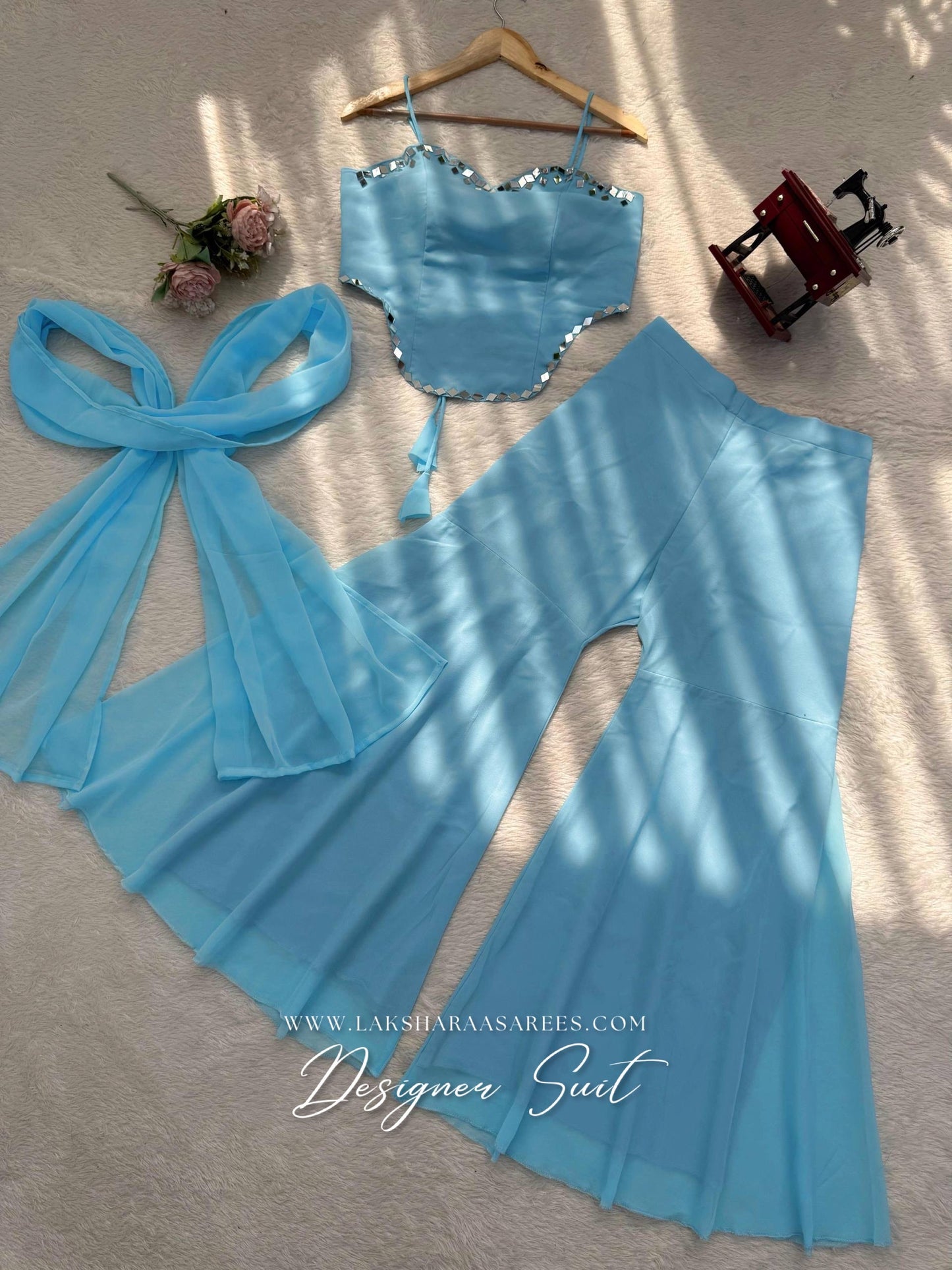 ISHITA 90s Special Georgette Corset Suit by Laksharaa Sarees, featuring intricate design and elegant fabric details.