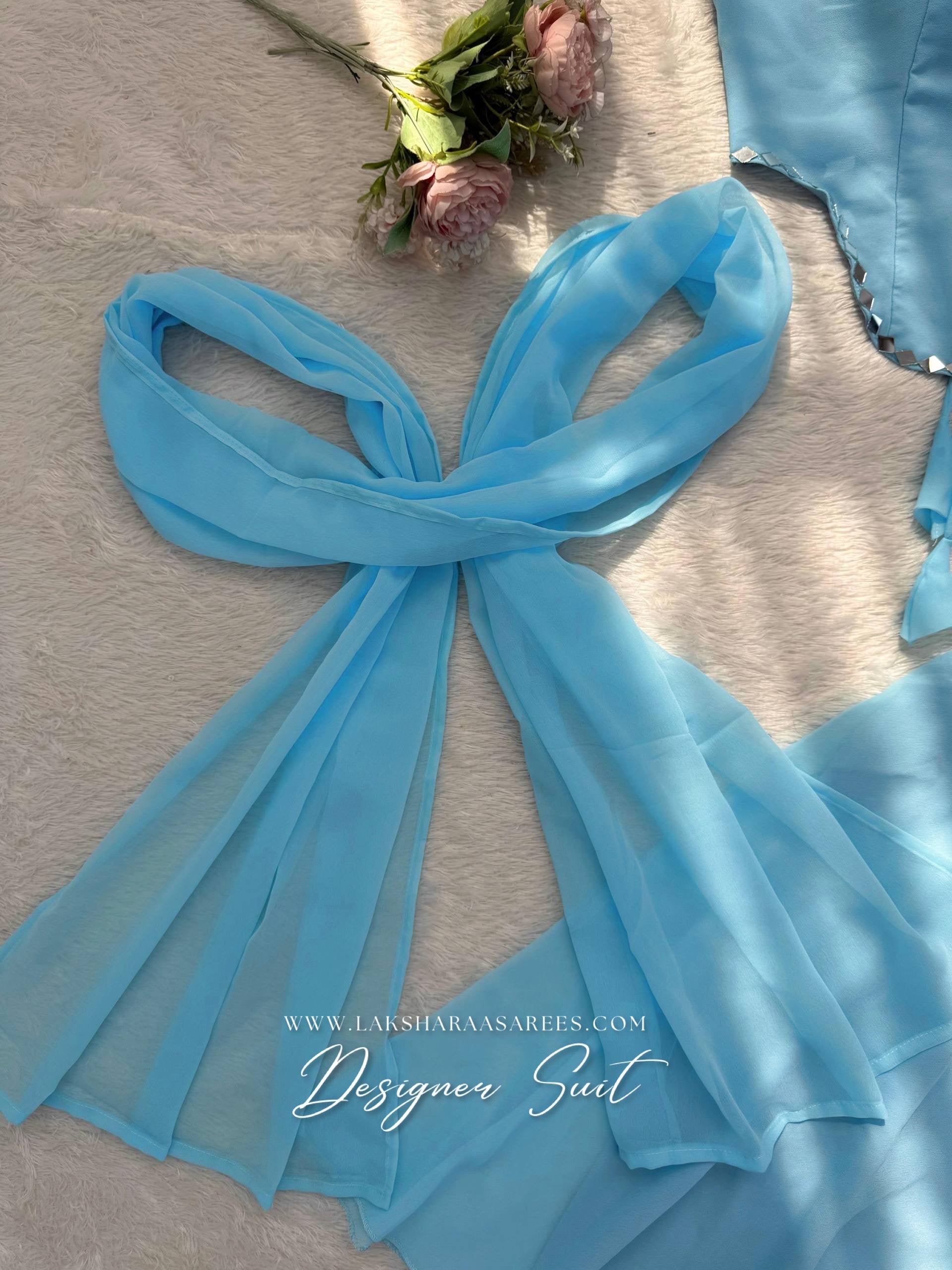 Elegant ISHITA 90s Georgette Corset Suit by Laksharaa Sarees featuring intricate design and traditional styling.